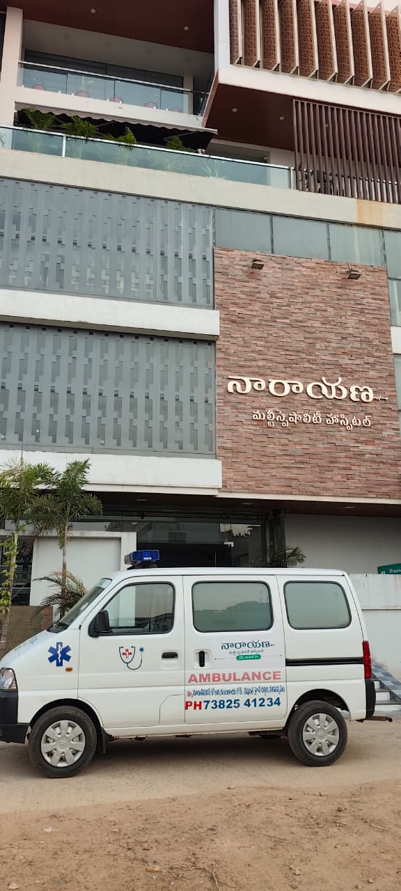 Hospital exterior with ambulance